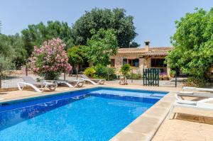 The swimming pool at or close to YourHouse Can Rafelino