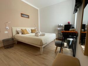 Postel nebo postele na pokoji v ubytování Caramel House & Villa