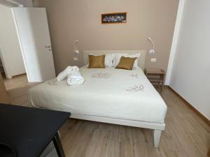 Postel nebo postele na pokoji v ubytování Caramel House & Villa