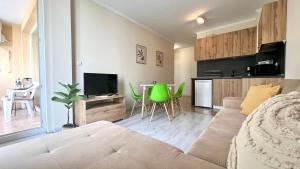 Телевизор и/или развлекательный центр в Bratanov Sveti Vlas Apartment