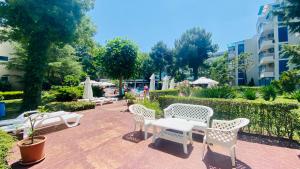 A garden outside Bratanov Excelsior Apartment
