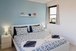 Postel nebo postele na pokoji v ubytování Tyler's House Ocean View + 25 fotografií