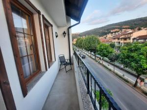 a balcony with a view of a street at Comfort Hotel Prizren in Prizren