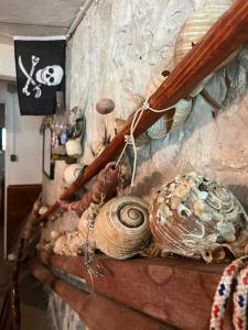 a snail sitting on top of a brick fireplace at Holiday home Stiniva in Vis