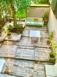 an overhead view of a patio with a table and chairs at Foodiejive in Antwerp