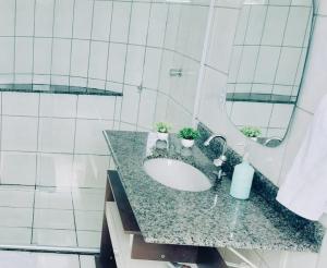 Bilik mandi di Casa central aconchegante