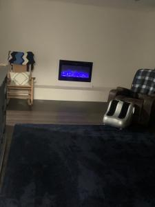 En eller flere senge i et værelse på Relaxing Retreat