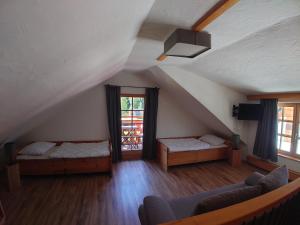 Postel nebo postele na pokoji v ubytování Alm Chalet Grosseck