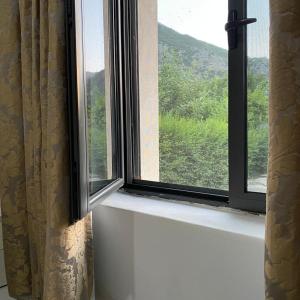 Nespecifikovaný výhled na hory nebo výhled na hory při pohledu z bed and breakfast