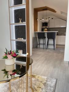 Kuchyň nebo kuchyňský kout v ubytování Legato Apartment