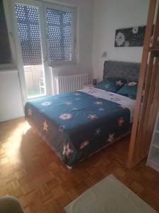 Postel nebo postele na pokoji v ubytování AIK Kula studio