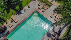 an overhead view of a swimming pool in a resort at XscapeTulum in Tulum