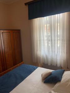 Postel nebo postele na pokoji v ubytování Rooms Vinka,Stomorska