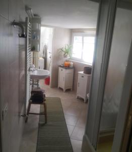 Kuchyň nebo kuchyňský kout v ubytování B&B 104