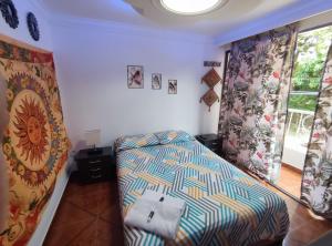 Postel nebo postele na pokoji v ubytování Hospedaje Casa Aurora