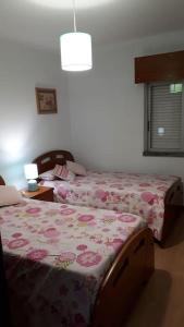 Postel nebo postele na pokoji v ubytování Isabel Dream V