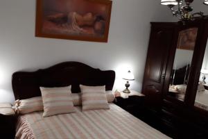 Postel nebo postele na pokoji v ubytování Isabel Dream V