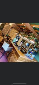 an overhead view of a bar with a person sitting at a counter at Limes hotel in Needham Market