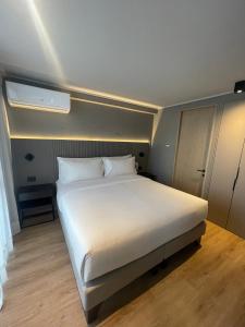 Cama o camas de una habitación en One Manquehue Aparthotel