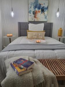 Giường trong phòng chung tại Le'Oasis Villa