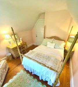 a bedroom with a bunk bed and a desk at 9 Booth Lane in Haverford