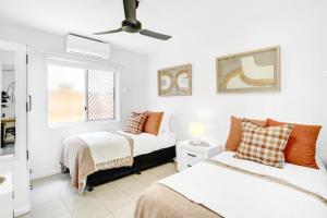 Postel nebo postele na pokoji v ubytování Tropical Terraces + 8 fotografií