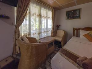 Voodi või voodid majutusasutuse Tongta Phaview Resort toas