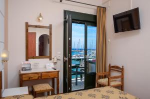Posteľ alebo postele v izbe v ubytovaní Hotel Coronis