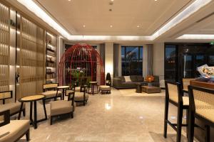 Predel za sedenje v nastanitvi Guangzhou Yunjia Hotel - Airport Terminal 2