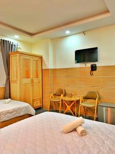 Katil atau katil-katil dalam bilik di S79 Hotel 868 Binh Tan
