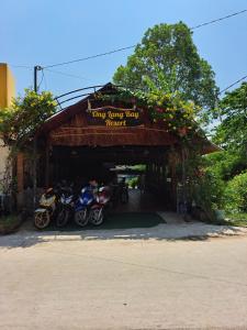 a group of motorcycles parked in a garage at Ong Lang Bay Resort in Phú Quốc