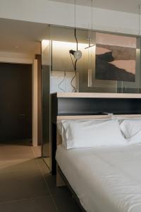 Кровать или кровати в номере Hotel Santa Ana Tudela