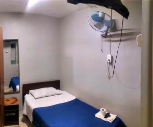 Voodi või voodid majutusasutuse Hostal Arica 3 toas