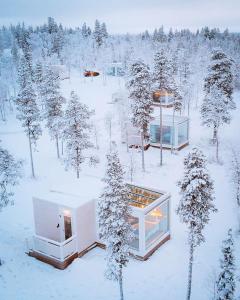 una representación de una casa en la nieve en Northern Lights Ranch, en Levi