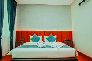 Sangkahak Mith Hotel客房内的一张或多张床位