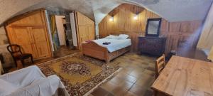 Posteľ alebo postele v izbe v ubytovaní Maison au Loup - Superbe ancien hotel particulier du XVIe siècle au cœur de la vieille ville du Puy