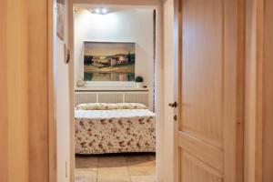 A bed or beds in a room at Agriturismo Percenna
