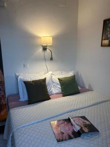 Postel nebo postele na pokoji v ubytování Beach House Buinac