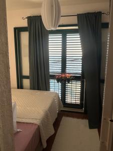 Postel nebo postele na pokoji v ubytování Beach House Buinac