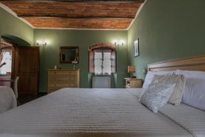 Postel nebo postele na pokoji v ubytování Albergo la Luna