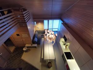 an overhead view of a kitchen and a living room at Luttotupa in Saariselka