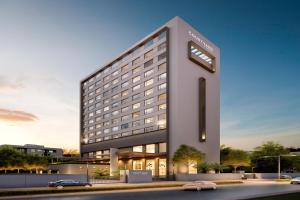 a rendering of a hotel building at Courtyard by Marriott Vadodara in Vadodara