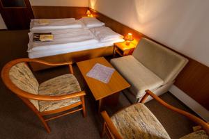 Łóżko lub łóżka w pokoju w obiekcie Hotel Bezdez Stare Splavy