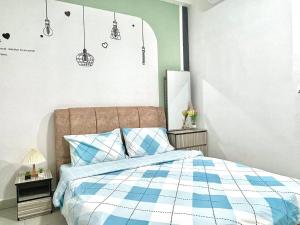Postel nebo postele na pokoji v ubytování NETIZEN near MRT 2-3pax Cozy Stay