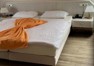 Letto o letti in una camera di Hotel Garni Classico
