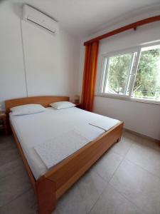 Postel nebo postele na pokoji v ubytování Accommodation Drasko