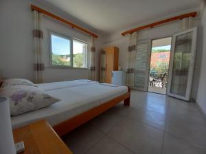 Postel nebo postele na pokoji v ubytování Accommodation Drasko