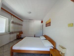 Postel nebo postele na pokoji v ubytování Accommodation Drasko