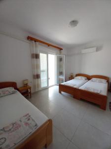 Postel nebo postele na pokoji v ubytování Accommodation Drasko