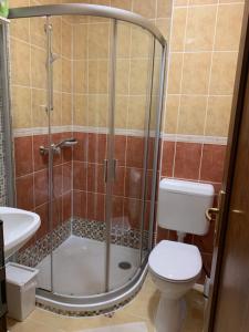Koupelna v ubytování Mandarin Wellness Apartman